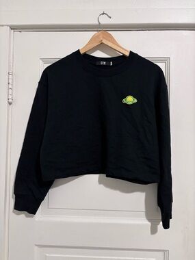 Black Cropped Crewneck Sweatshirt with Green Planet Patch